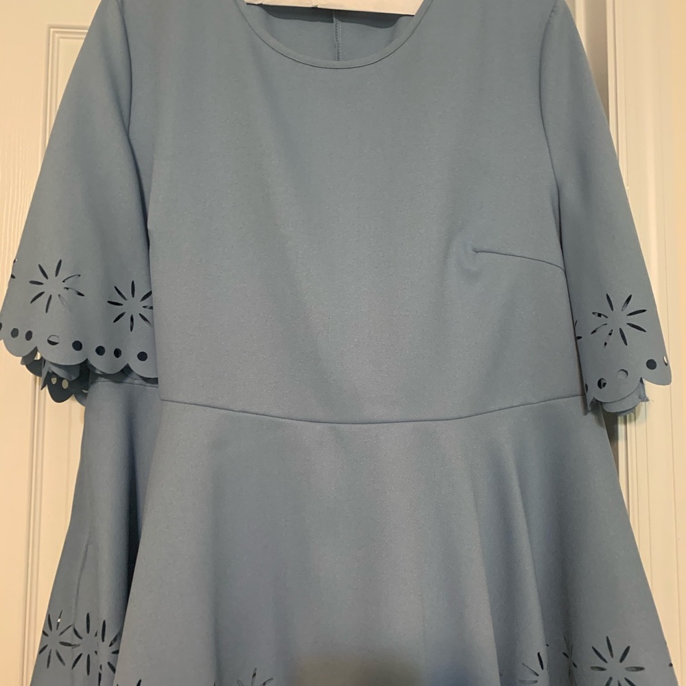 Dressy top. Runs smaller, fits person as 2-3x size